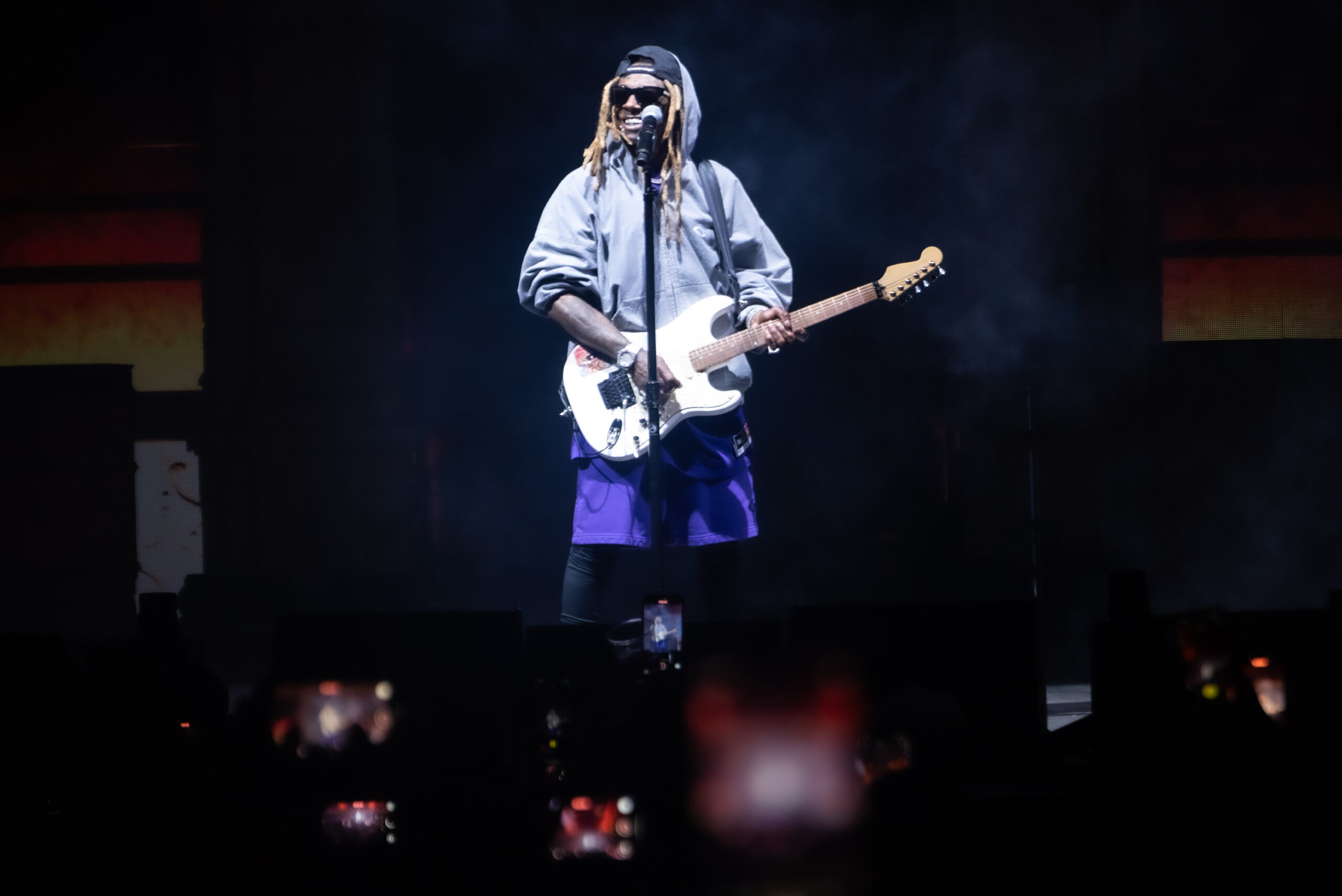 Lil Wayne enters the stage while showing off his guitar skills with an impressive solo during “Tha 
Carter VI Tour.” 
