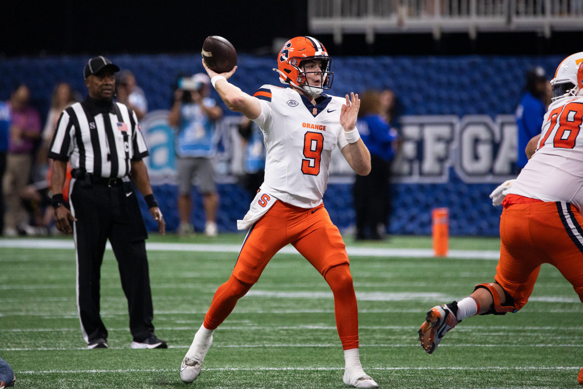Syracuse quarterback Steve Angeli drops back to throw a pass. Angeli tossed for a career-high 274 passing yards in his SU debut
