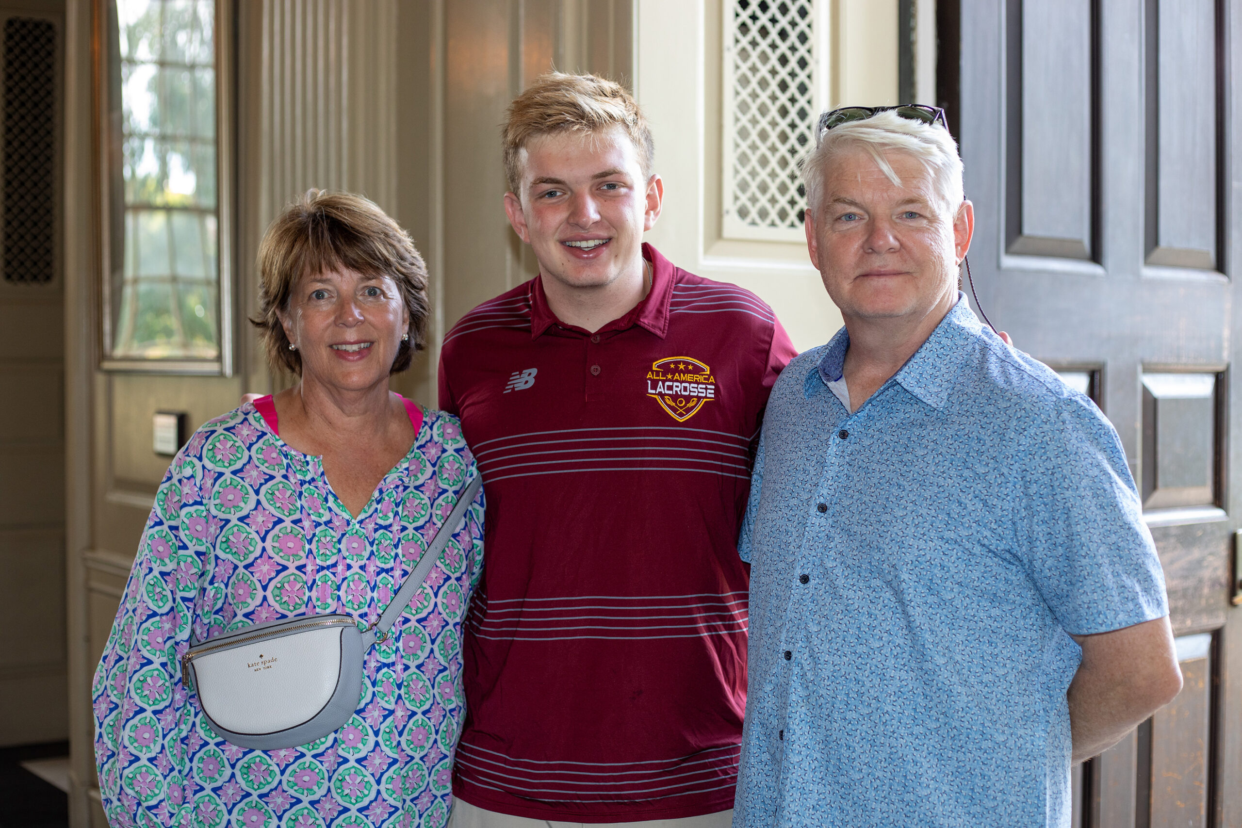 SU sophomore Collin Smith and his family pose for a photo before a Catholic service in Hendricks Chapel. Students and their families attended numerous events around campus, including religious services, college tours and performances by student music groups.