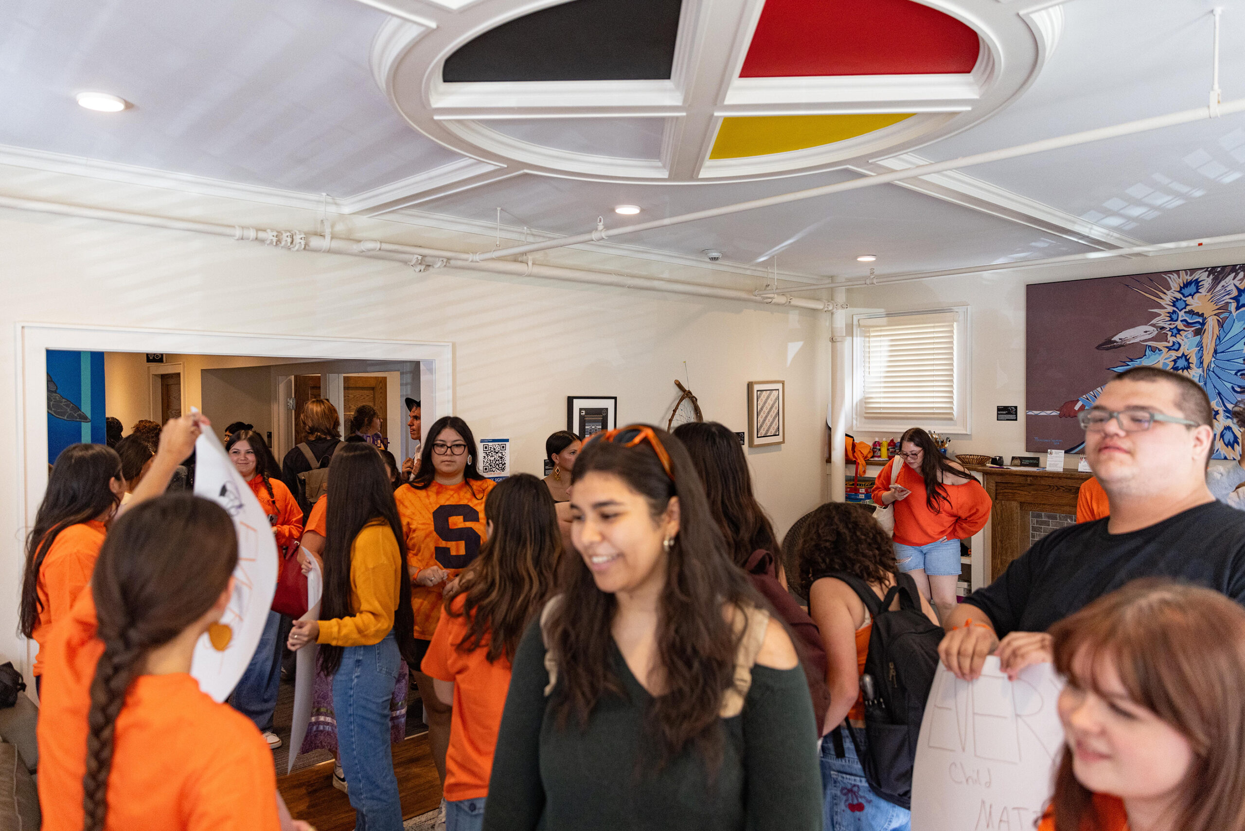 Members of the organization gather inside the Native Student Program’s office at 113 Euclid Avenue ahead of the walk.