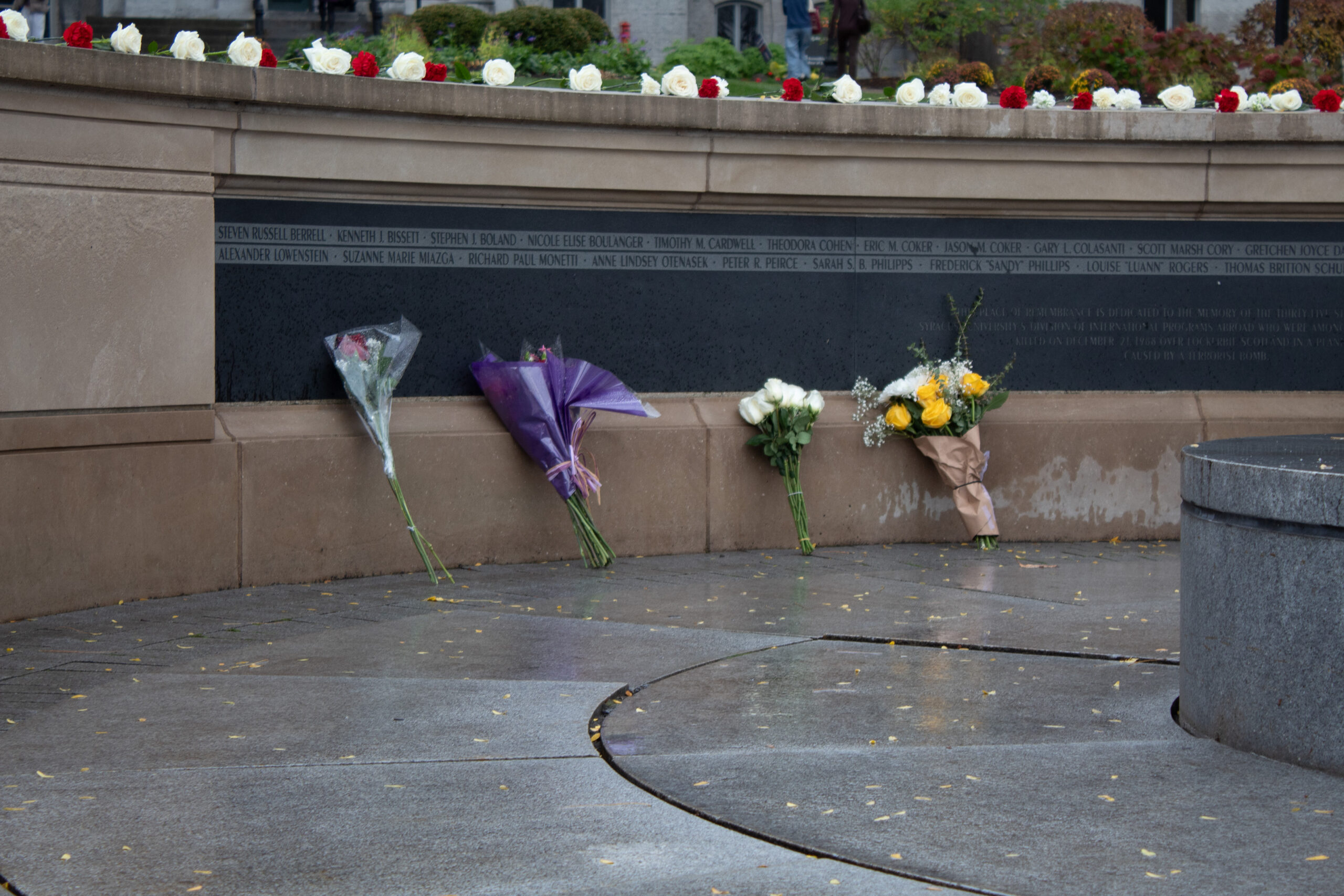 Roses line the Place of Remembrance in front of the Hall of Languages following the Rose Laying Ceremony. Remembrance and Lockerbie Scholars placed 46 roses, representing the victims of the Pan Am Flight 103 bombing.