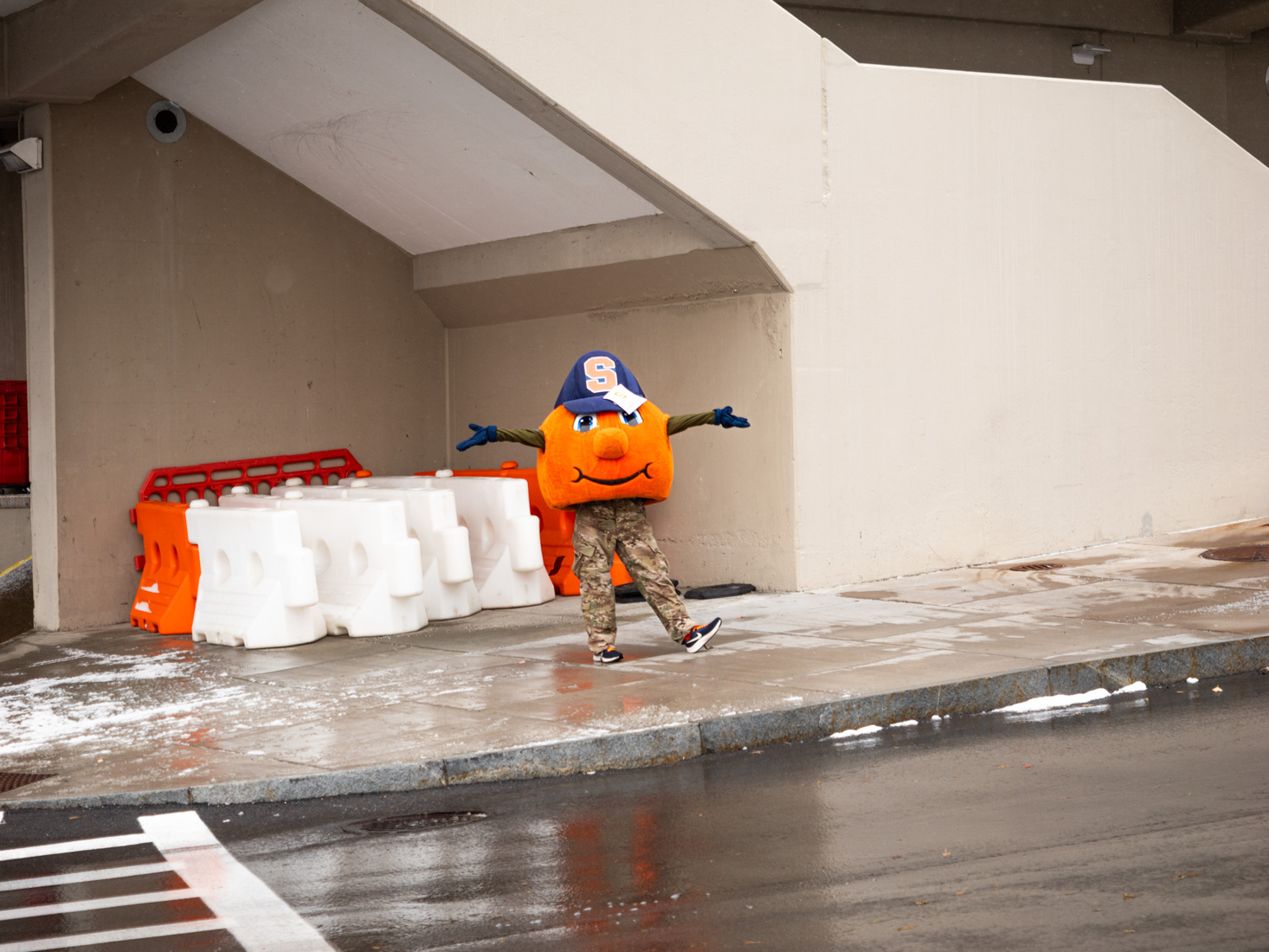 Otto the Orange joyously walks around campus as they celebrate the incoming winter season. Otto was also dressed for Veterans Day on Tuesday.