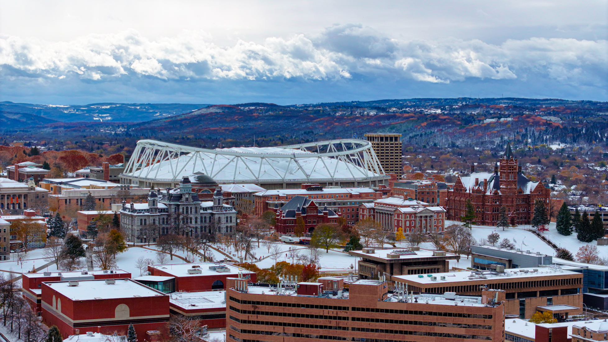 A blanket of snow covers Syracuse University’s campus as it experiences the first snowfall of the school year. The first flakes arrived on Monday, with more accumulating on Tuesday.  