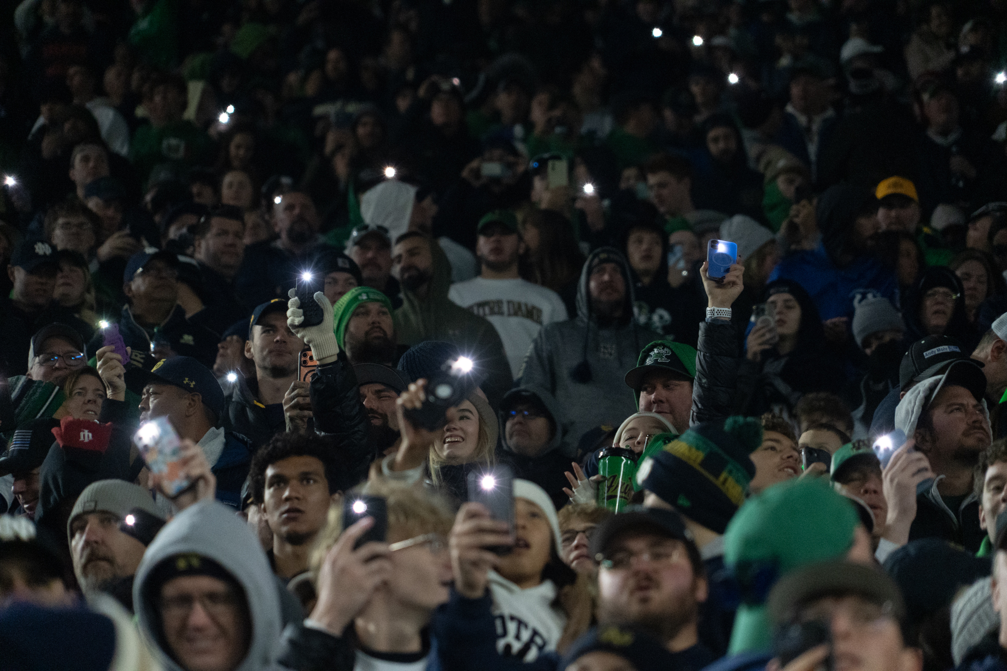 Notre Dame fans wave their flashlights in the air during ND’s 63-point win. Attendance reached 77,622, over 30,000 more people than the JMA Wireless Dome can hold.