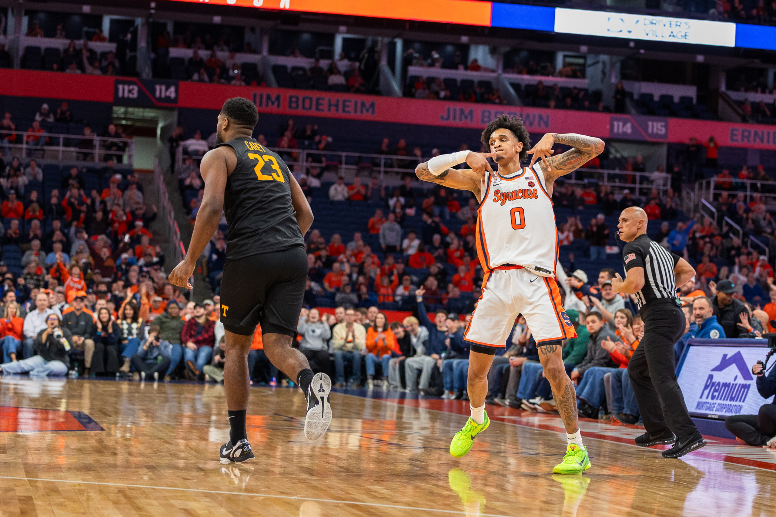 Syracuse freshman forward Sadiq White celebrates after hitting a 3-pointer in the second half. Starting in place of Donnie Freeman, White scored 10 points in SU’s win over Tennessee.