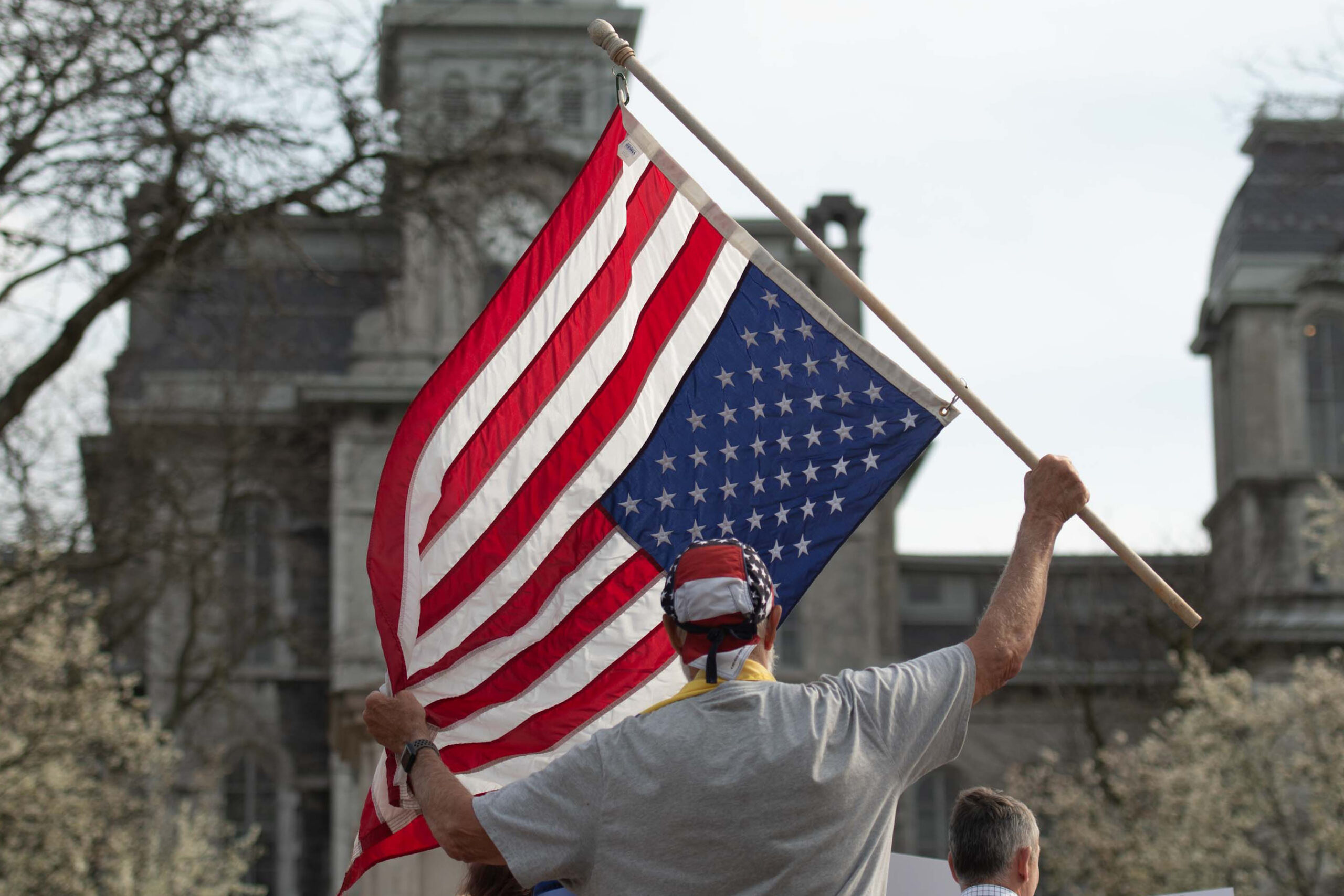 April: Hundreds rally at Syracuse University to condemn federal attacks on higher education. Demonstrators, including faculty and students, at the “Hands Off!” protest waved signs and upside-down U.S. flags.