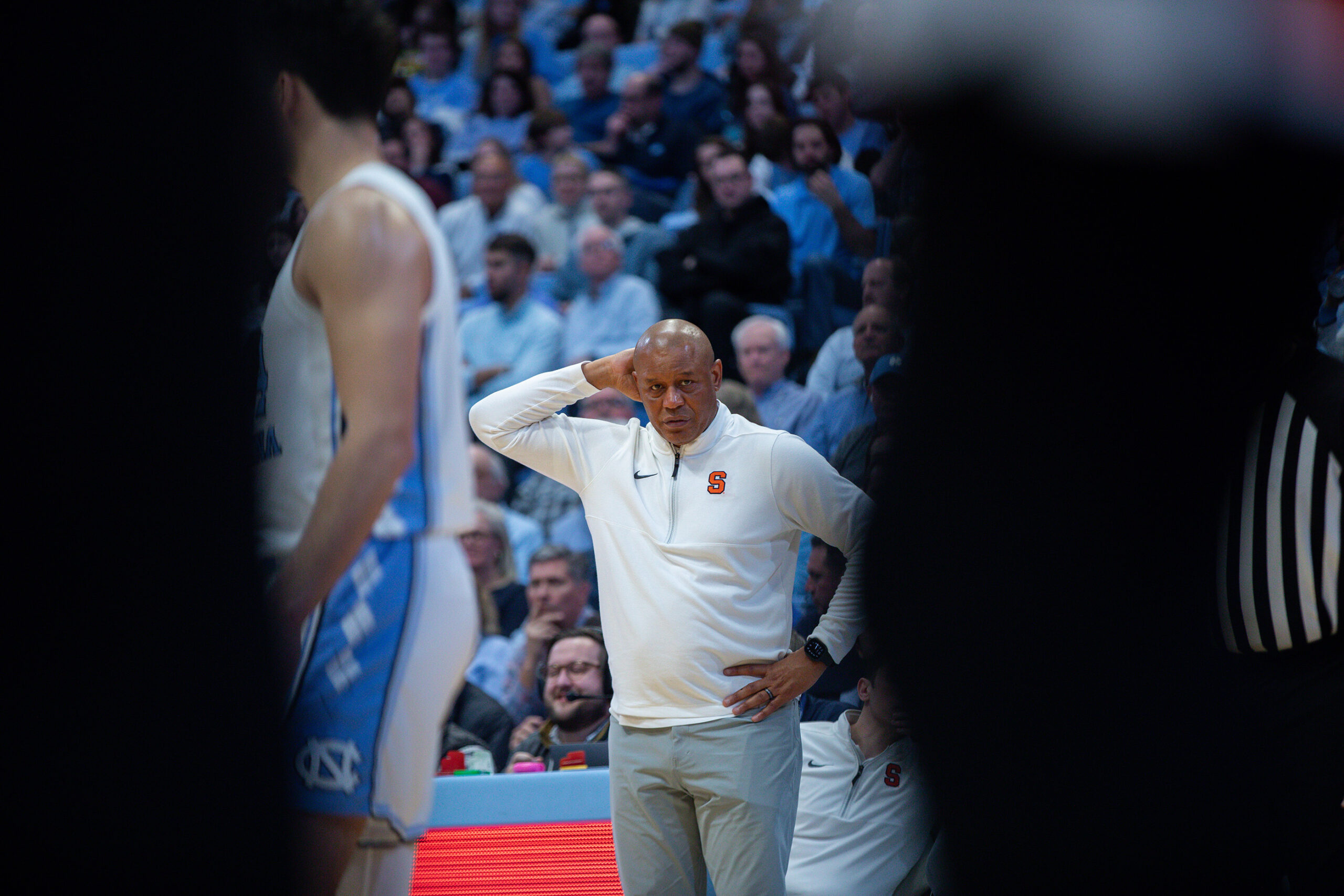 Adrian Autry looks onto the court in disgust while putting his right hand on the back of his head and his left hand on his hip. SU’s loss to UNC worsened its record in Quad 1 games to 4-22 in Autry’s tenure as head coach.