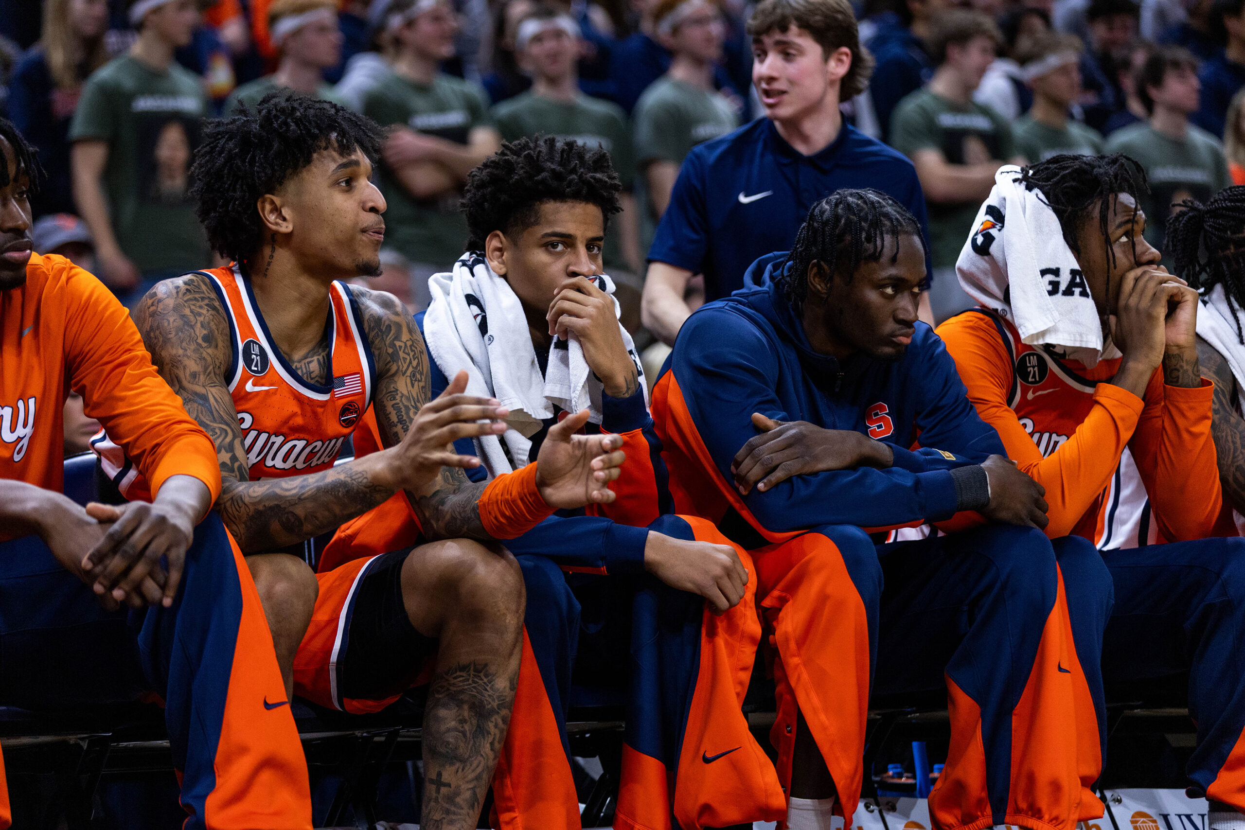 Kiyan Anthony sits on Syracuse’s bench with his hand over his mouth during its game against Virginia. In what Adrian Autry labeled as a coach’s decision, Anthony logged the first game of his young career in which he didn’t play.