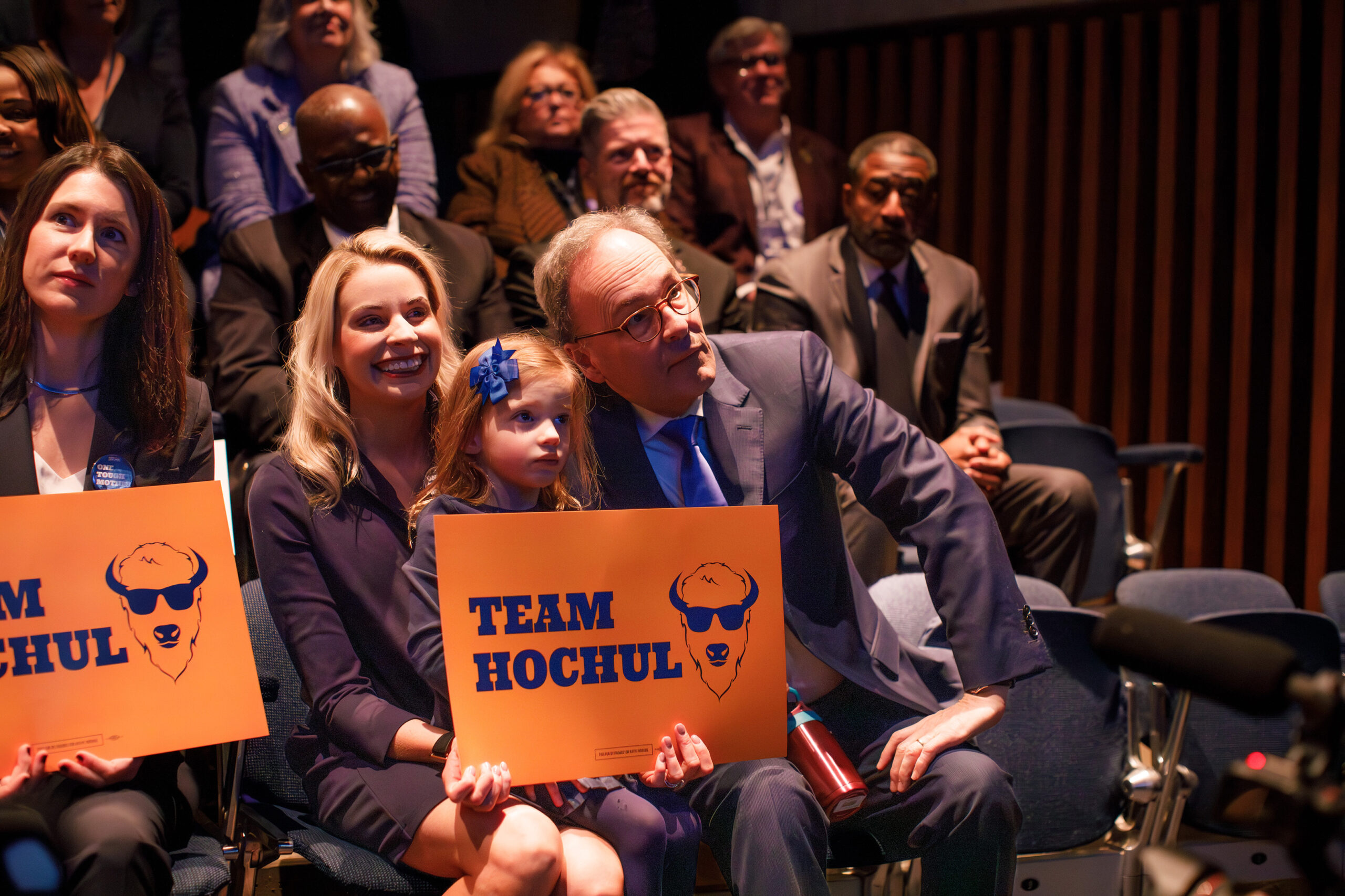 The governor’s husband, William Hochul Jr., watches his wife on stage with his daughter-in-law, Christina Gervasi, and granddaughter, Sofia. Several state democratic figures showed up in support of Hochul amid her bid for re-election.