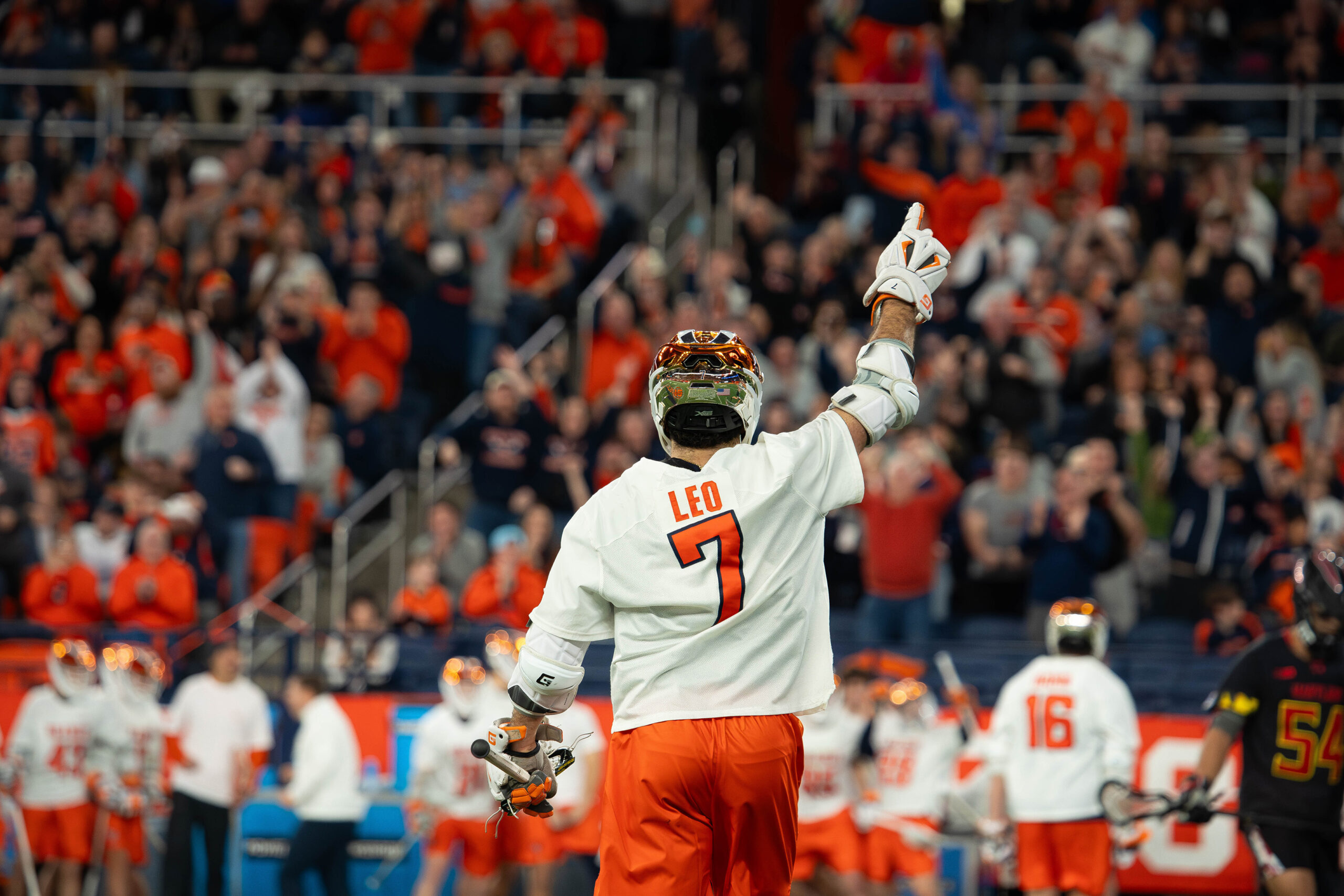Syracuse men’s lacrosse midfield/attack Michael Leo points his hand to the sky during No. 2 Syracuse’s statement 11-9 win over No. 1 Maryland. Leo scored two goals in the Orange’s first win over the Terrapins since 2009.
