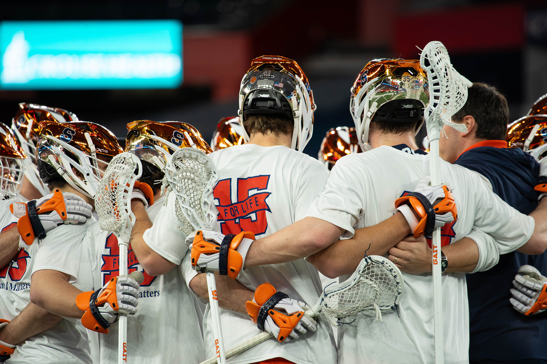No. 2 Syracuse men’s lacrosse huddle during its signature victory versus No. 1 Maryland Friday. The Orange ended an eight-game losing run against the Terrapins and will likely rise to No. 1 in the nation for the first time since 2020.