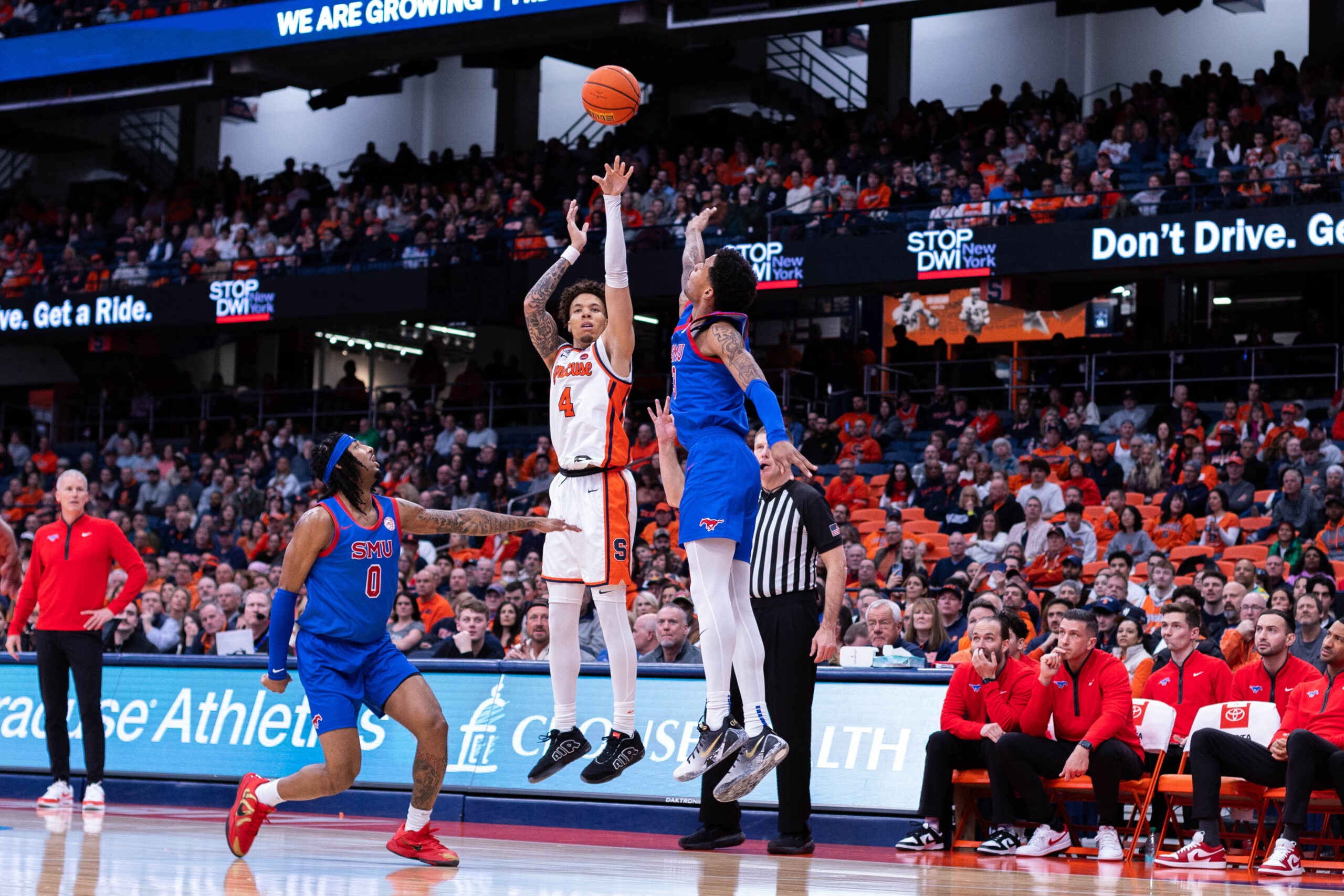 Syracuse guard Nate Kingz rises for a 3-point shot in Syracuse’s one-point win against SMU. Kingz scored the game-winning shot on a layup with two seconds remaining to complete a 12-point second-half comeback for the Orange.