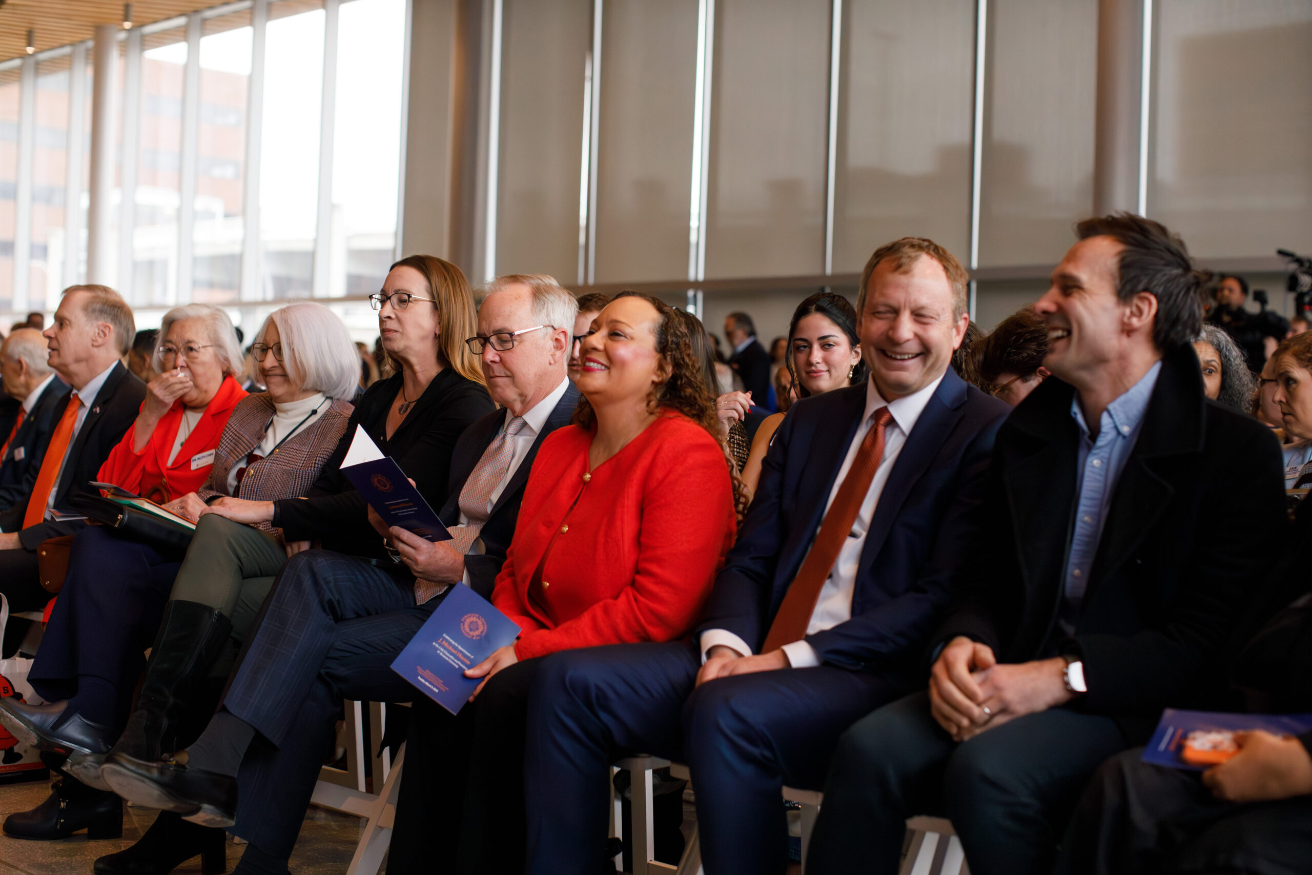 Provost Lois Agnew and Dean of Newhouse Mark Lodato sitting front row at the event. University higher-ups, ROTC members and staff filled the Bisignano Grand Hall for the announcement. 