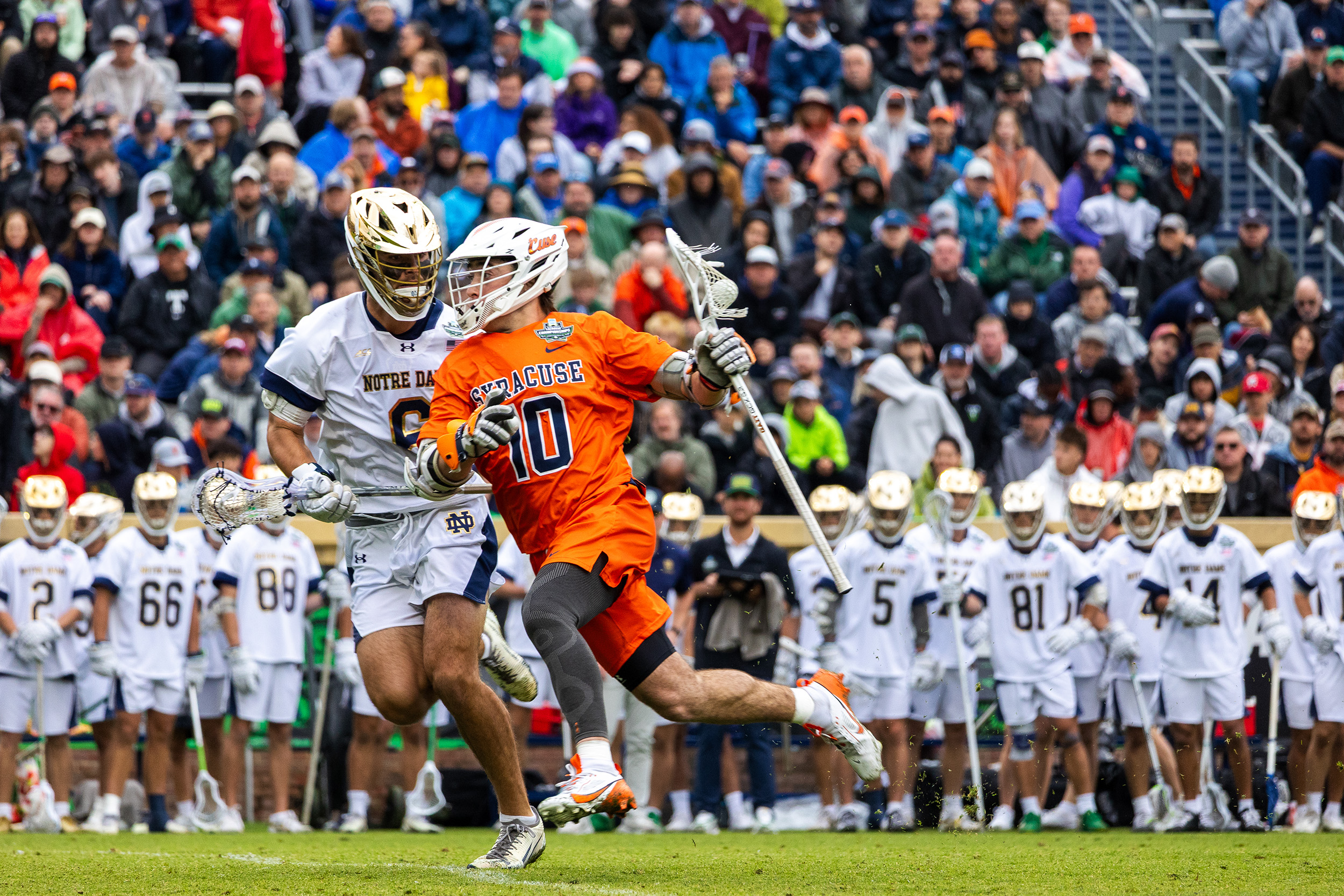 SU midfielder Matt McIntee tries to weave past ND midfielder Fisher Finley. McIntee was held pointless while Finley scooped up two ground balls and caused a turnover.