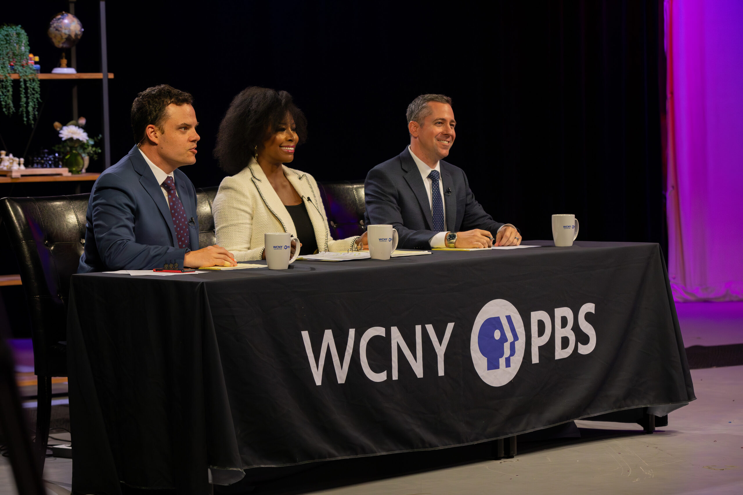 David Lombardo, host of WCNY’s The Capitol Pressroom, Nina Moore, a political science professor at Colgate University, and Chris Baker, syracuse.com’s public affairs editor served as moderators sitting at a table across from candidates 