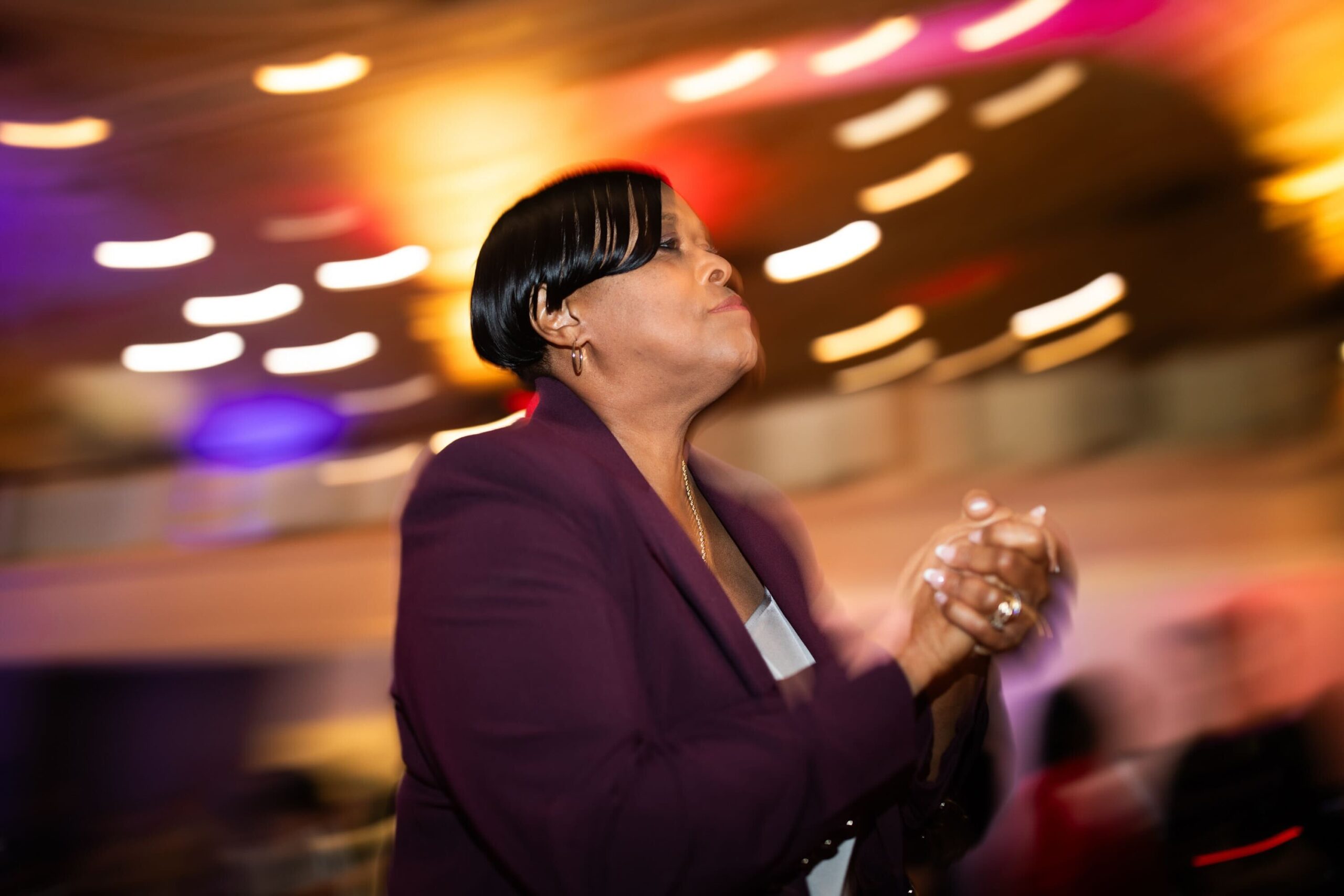 woman walks in crowded room