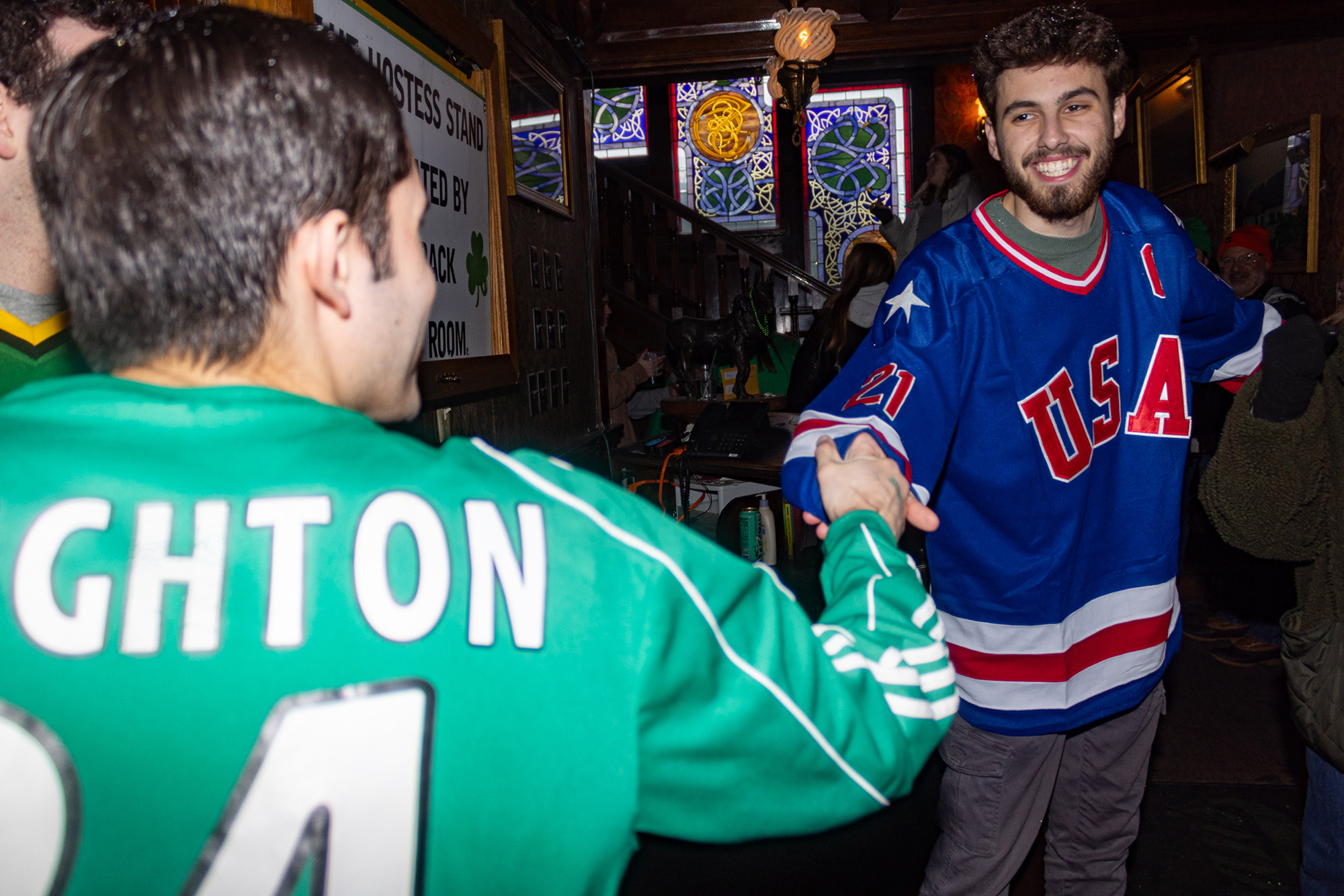 Students standing in the lobby of Brewster Hall.