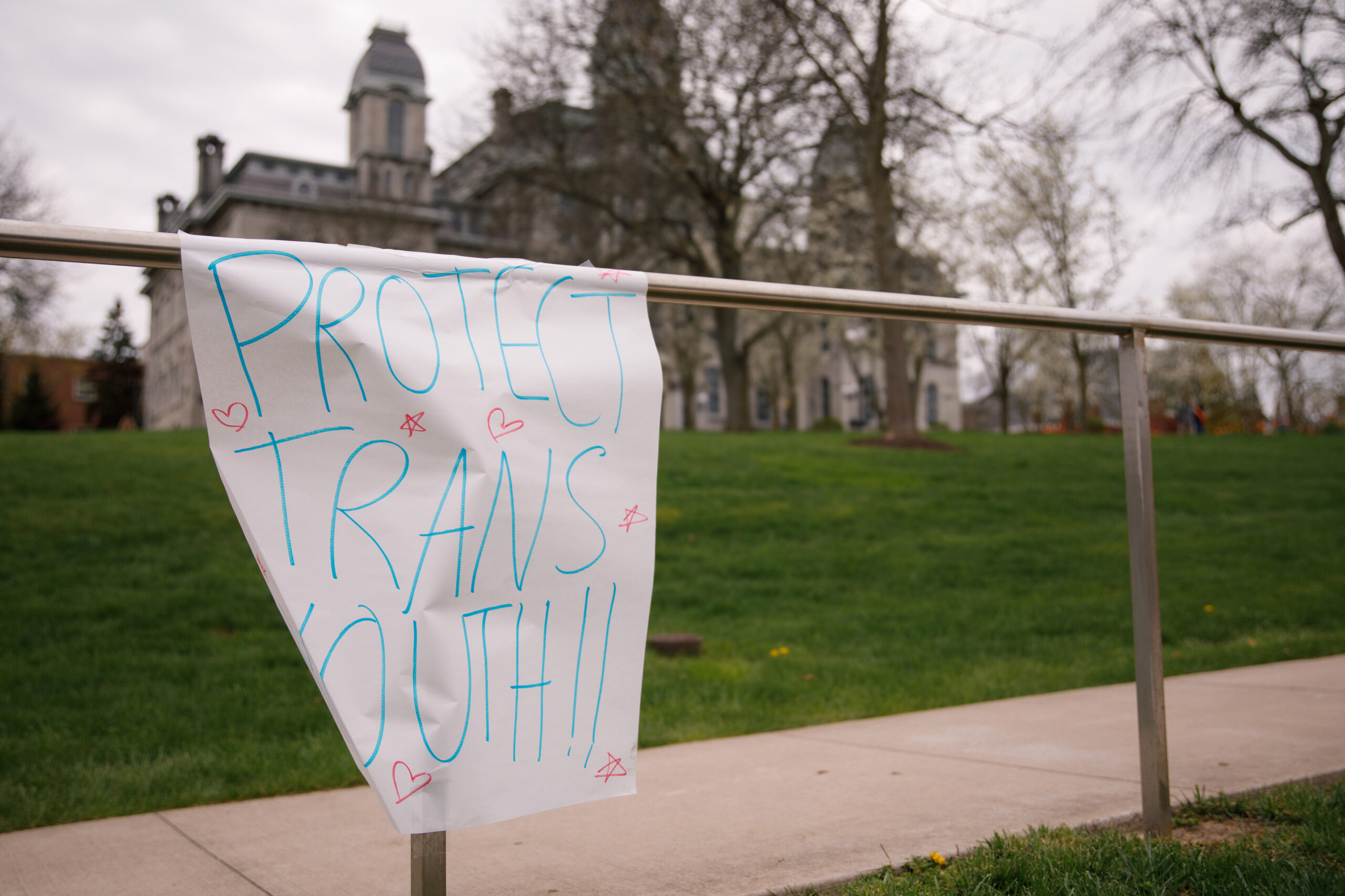 Sign says "Protect Trans Youth"
