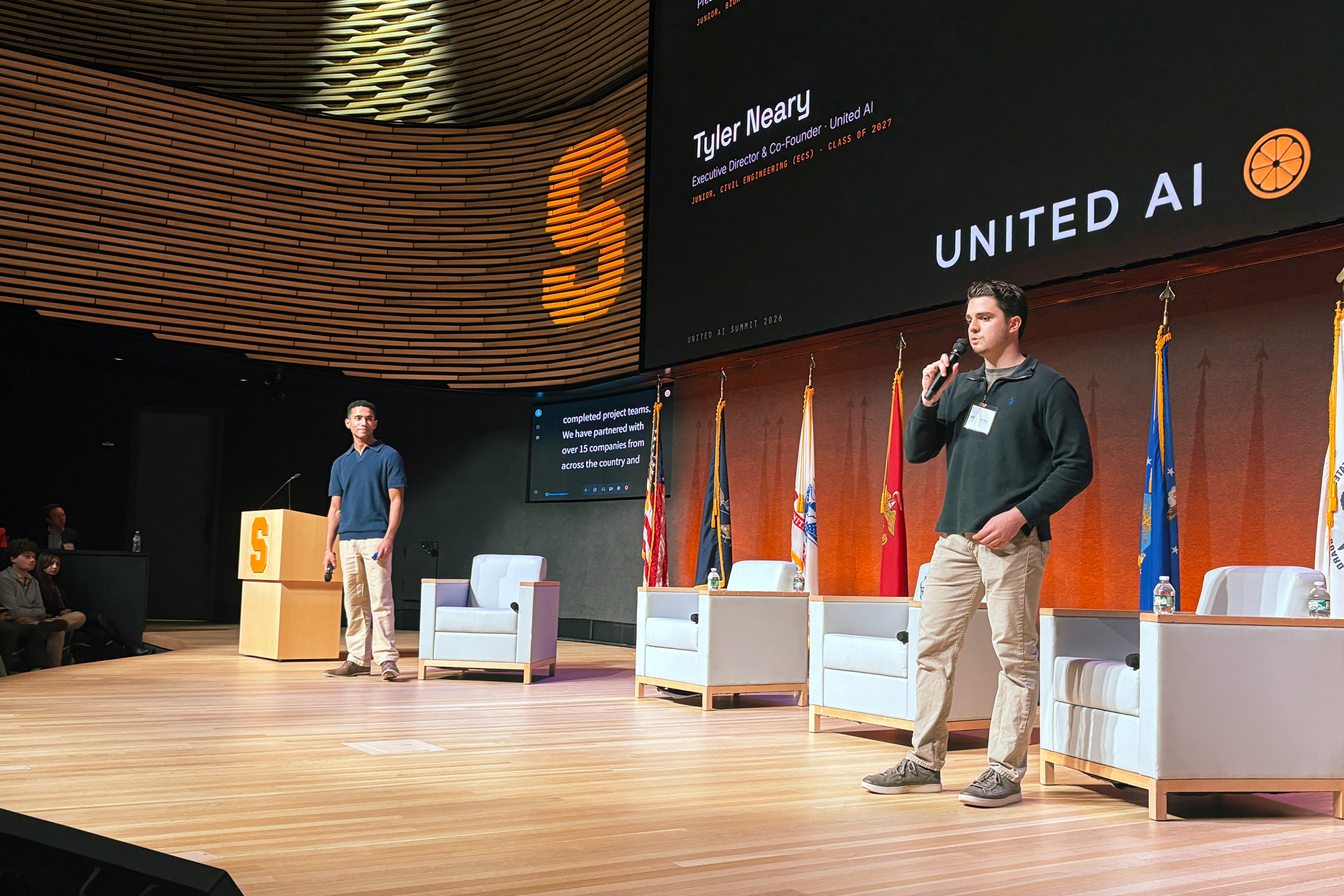 two speakers on stage
